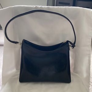 Liz Clairborne purse, color Black. Gentle used. See tiny white mark.